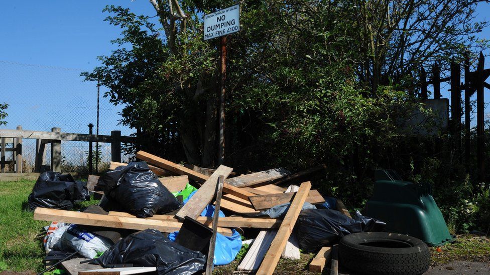 Rubbish dumped under a no dumping sign