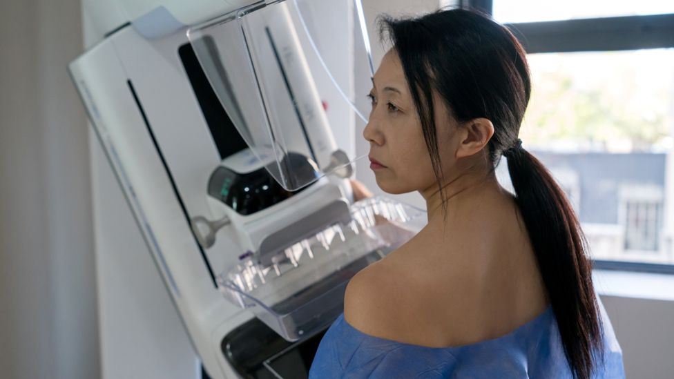 Patient getting a mammogram exam