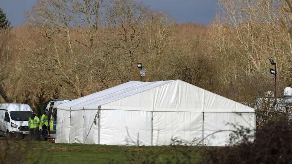 A marquee has been set up as police continue their search