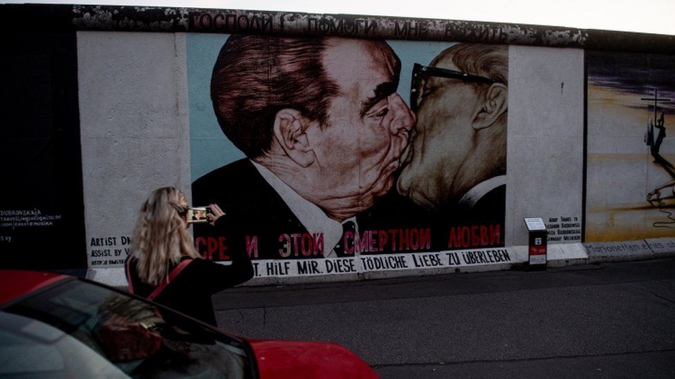 This graffiti painting by Dmitry Vrubel on the Berlin Wall depicts Soviet leader Leonid Brezhnev kissing East Germany's Erich Honecker