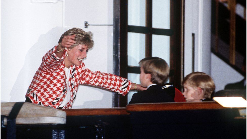 Diana greets her sons Prince William and Prince Harry on the deck of the yacht Britannia in Toronto, 23rd October 1991
