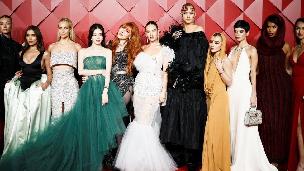 Lorena Rae, Olivia Culpo, Poppy Delevingne, Han So Hee, Charlotte Tilbury, Lily James, Harris Reed, Sabrina Carpenter, Dixie D'Amelio, Sabrina Elba, and Demetra Pinset pose on the red carpet at the Fashion Awards 2022