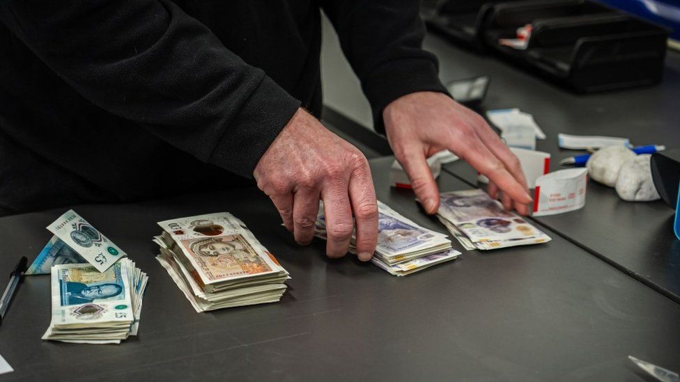 Cash seized by police in fraud crackdown