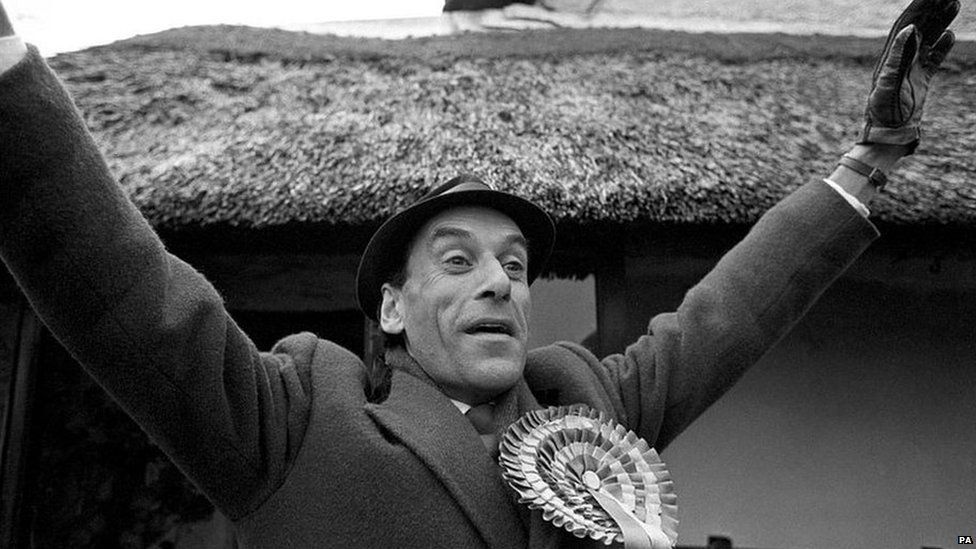 Jeremy Thorpe waves to the crowds outside his Cobbaton home before voting in the February 1974 election