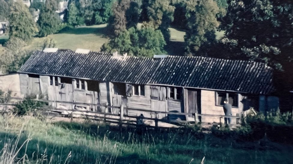 A photo showing what the barn used to look like