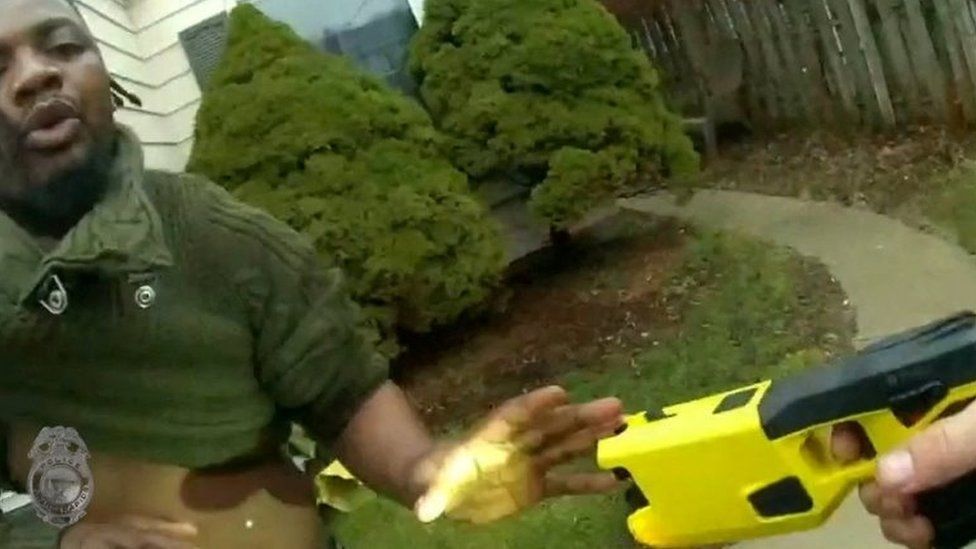 Patrick Lyoya blocks a taser weapon held by a police officer following a traffic stop in Grand Rapids, Michigan, on 4 April 2022