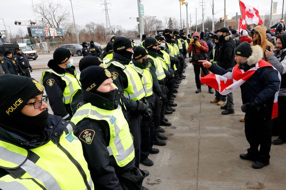 Police face protesters in Windsor