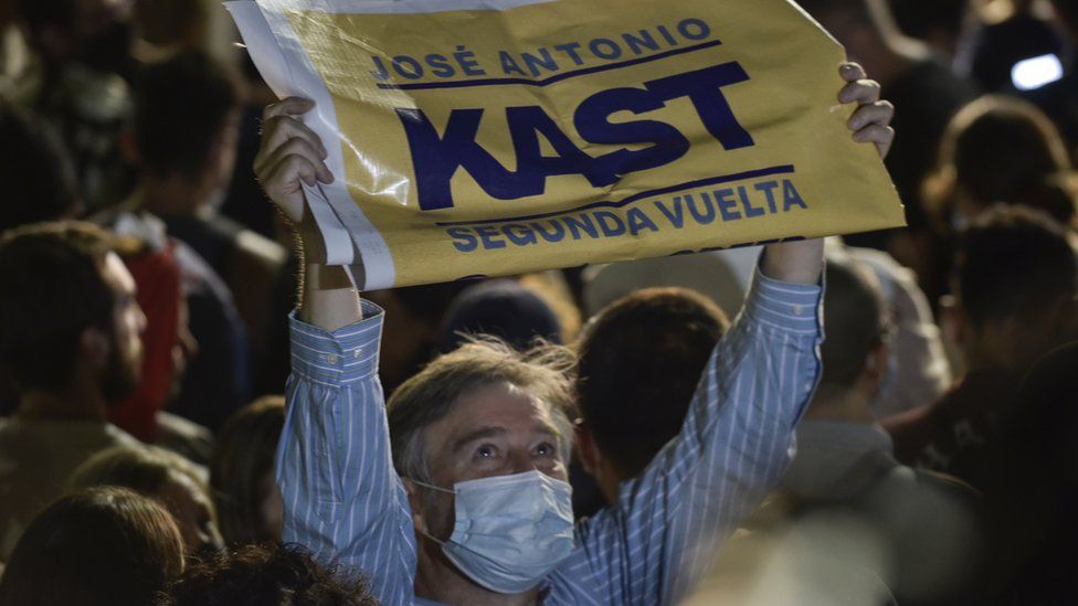 A supporter of candidate of the Republic party Jose Antonio Kast celebrates at the end of the Presidential Elections on November 21, 2021 in Santiago, Chile.
