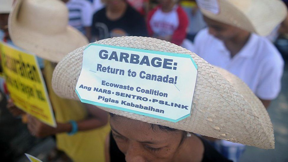 Environmental activists rally outside the Philippine Senate in Manila on September 9, 2015