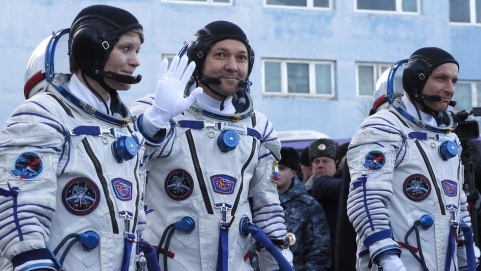 Members of the International Space Station (ISS) expedition 58/59, CSA astronaut David Saint-Jacques (L), Roscosmos cosmonaut Oleg Kononenko (C) and NASA astronaut Anne McClain (R)