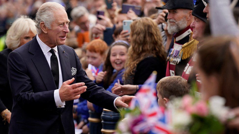King Charles greets people outside Hillsborough Castle