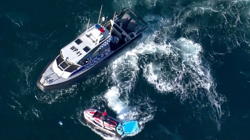 Police patrol boats at the scene on Wednesday