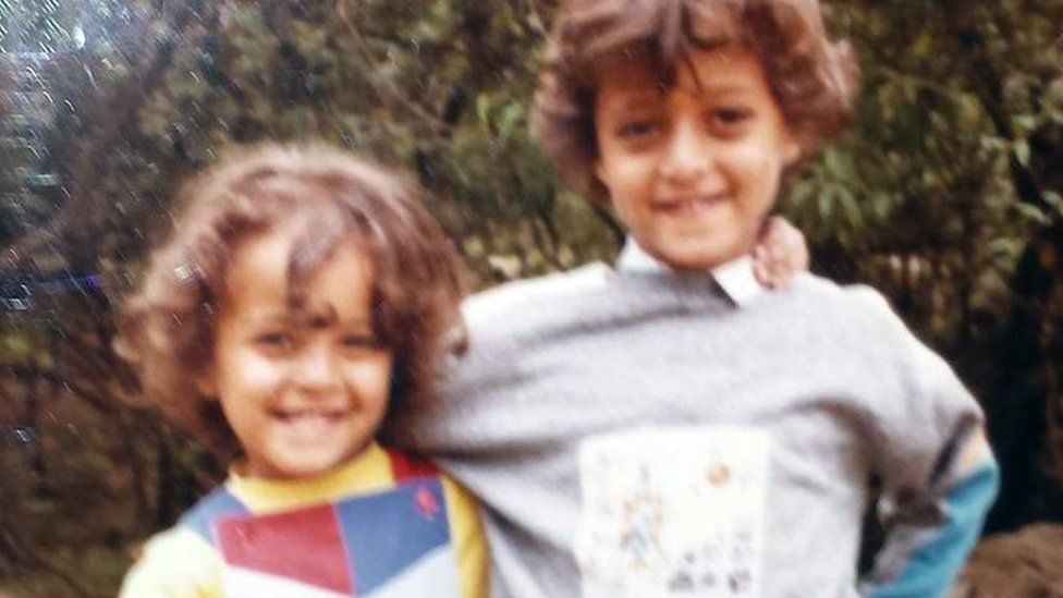 Childhood photo of Mai Noam and her brother in Taiz