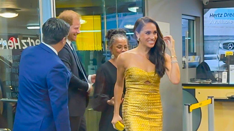 Prince Harry with Meghan and her mother Doria arriving at the awards event