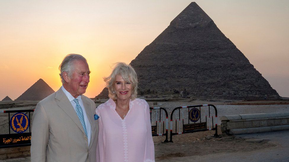 Prince Charles and the Duchess of Cornwall pose in front of the Great Pyramids of Giza, on the outskirts of Cairo, Egypt