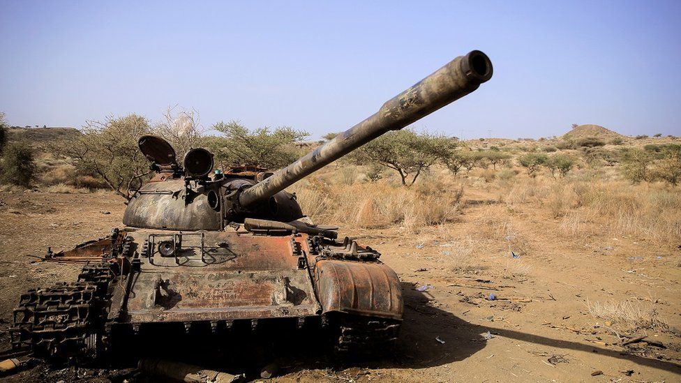 A destroyed tank is seen in a field in the aftermath of fighting between the Ethiopian National Defence Force (ENDF) and the Tigray People"s Liberation Front (TPLF) forces in Kasagita town, in Afar region, Ethiopia, February 25, 2022.