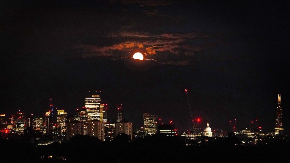 moon over London skyline