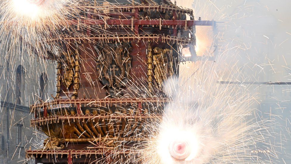 A cart, packed full of fireworks and other pyrotechnics, is lit by the archbishop to provide a historic spectacle, during 'Explosion of the Cart' event, known as Scoppio del Carro within Easter celebration in Florence