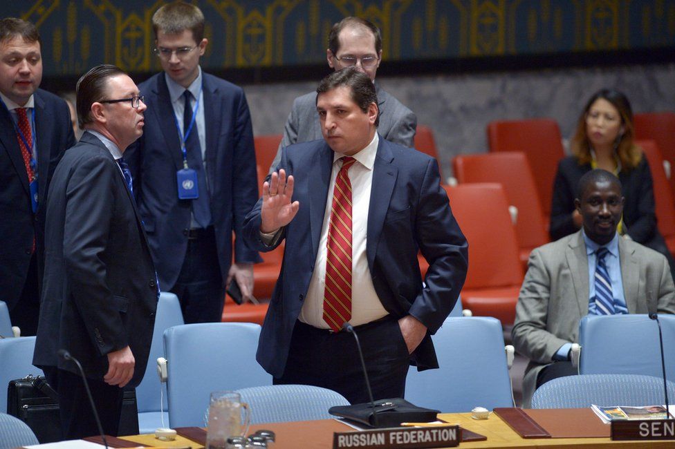 Russia's deputy UN ambassador, Vladimir Safronkov, arrives for a United Nations Security Council meeting on Syria, at the UN headquarters in New York, 7 April