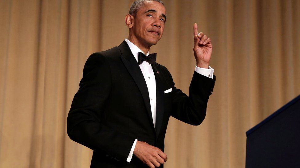 U.S. President Barack Obama gestures at the White House Correspondents" Association annual dinner in Washington, U.S., April 30, 2016