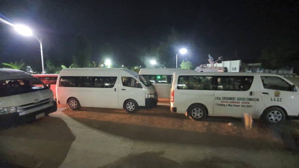 Image shows buses carrying the girls