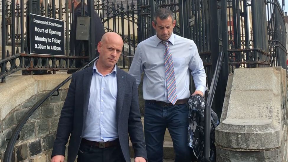 Andrew Eric Johnston and Mark Johnston leaving court