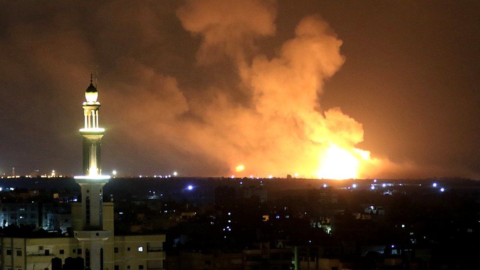 Smoke and flames rise after Israeli warplanes launched airstrikes in Khan Yunis, Gaza