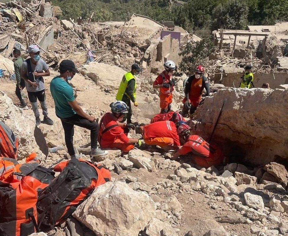 The UK International Search and Rescue team search for survivors trapped under collapsed buildings in the mountains of Asni, in Morocco