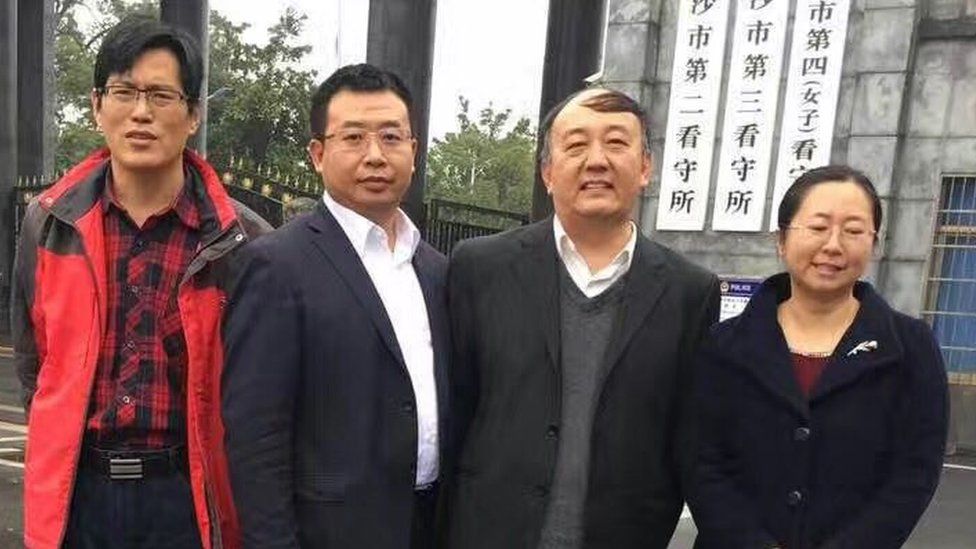 Picture of detained Chinese lawyer Jiang Tianyong (second from left) and Chen Guiqiu (far right)