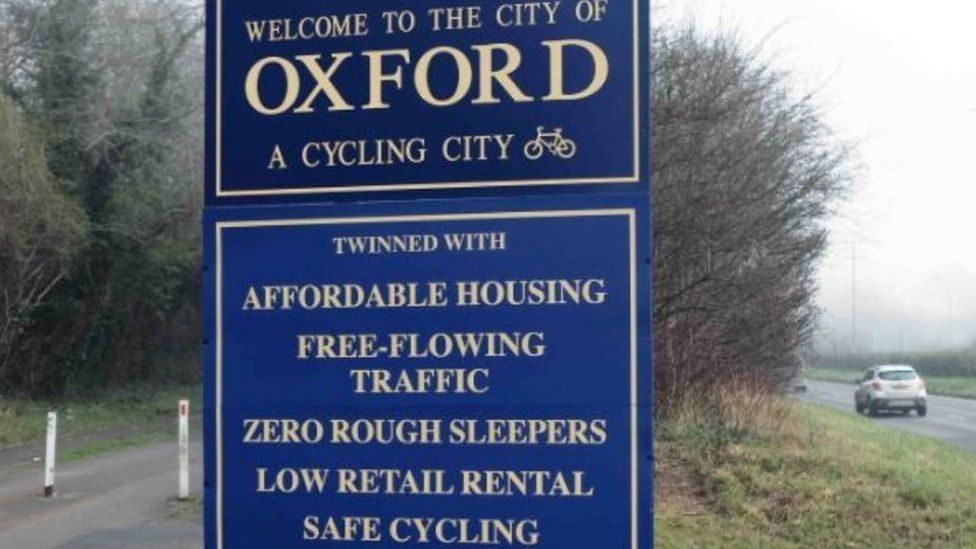 The sarcastic Oxford welcome sign near Littlemore