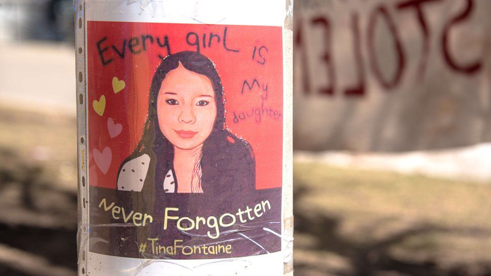 A poster commemorates Tina Fontaine, a young indigenous girl who was killed in 2014