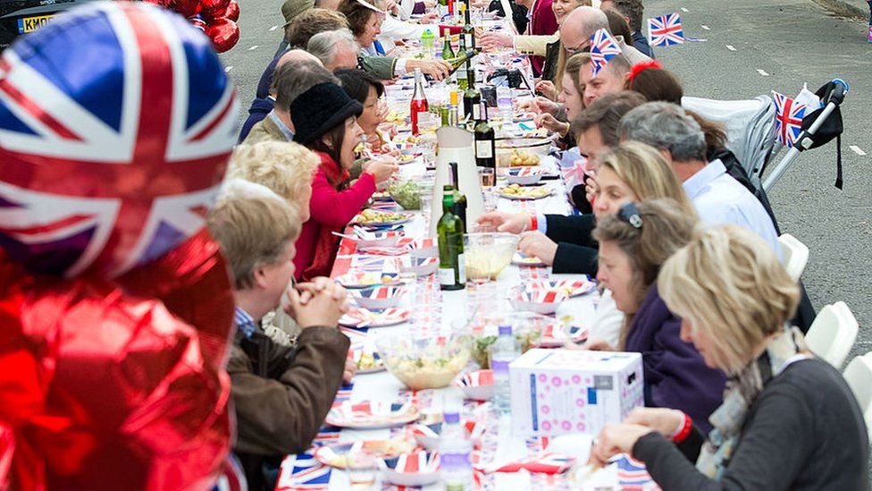Lunch is enjoyed at a street party in Kensington during the Queen's Diamond Jubilee celebrations on June 4, 2012