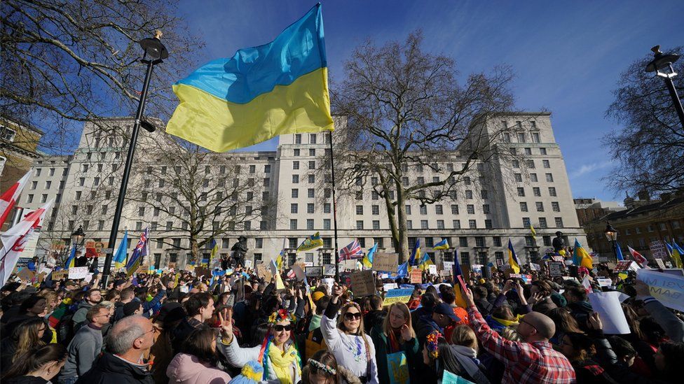 People take part in a demonstration on Whitehall, at the entrance to Downing Street, London, to denounce the Russian invasion of Ukraine