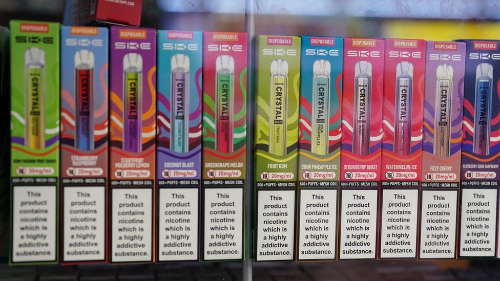 A collection of vapes in a shop