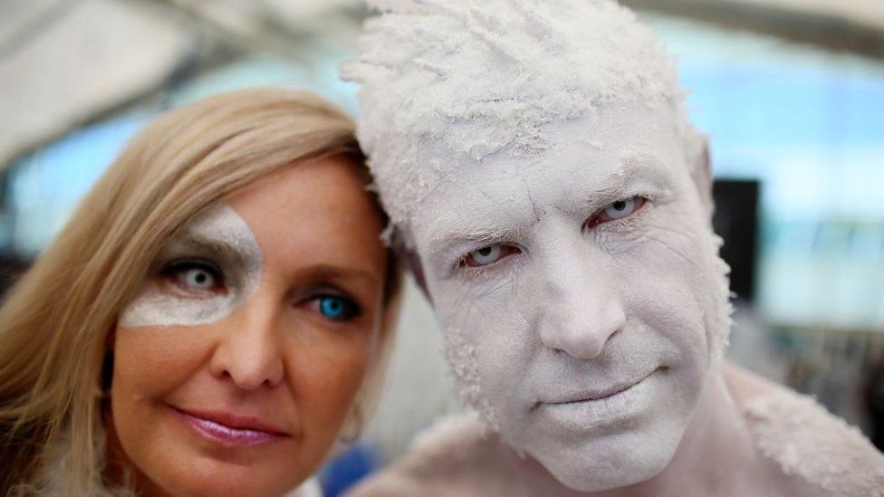 Todd Schmidt (r) and his wife, (name not given) dressed as the Iceman at the San Diego Convention Center during Comic Con International on July 20, 2017 in San Diego