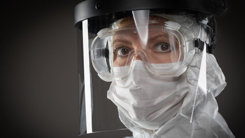 woman in PPE