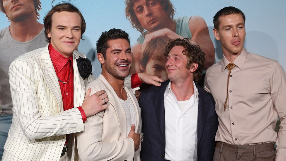 Actors Stanley Simons, Zac Efron, Jeremy Allen White and Harris Dickinson pose for picture during "The Iron Claw" Dallas premiere at The Texas Theatre on November 8, 2023 in Dallas, Texas