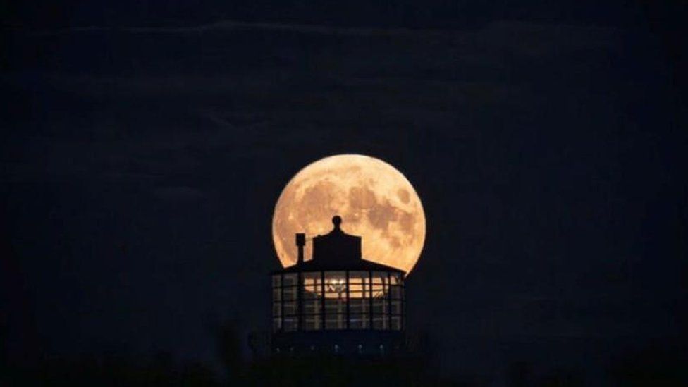 The supermoon behind Belle Tout lighthouse in Eastbourne