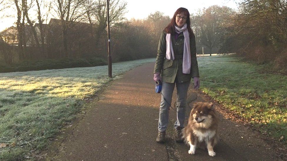 Sara Millington out for a walk with a dog in Milton Keynes