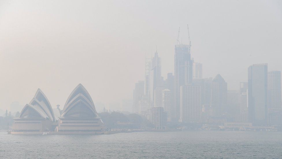 Sydney Opera House and skyline obscured by the smoke