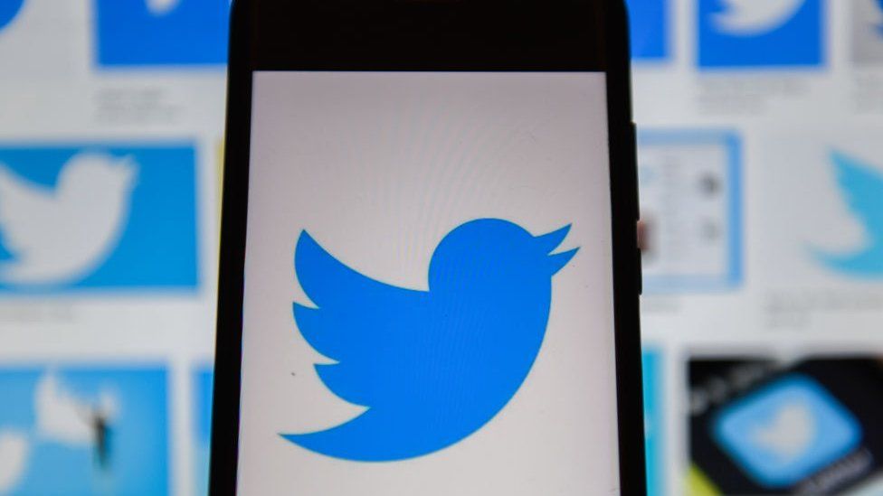 Twitter logo seen displayed on a smartphone.