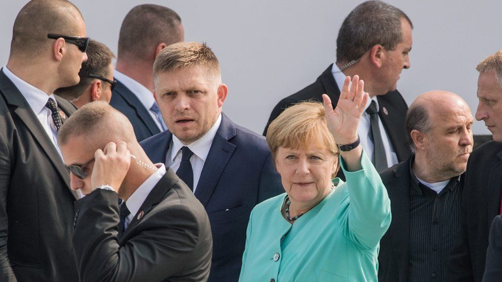 German Chancellor Angela Merkel next to Slovak Prime Minister Robert Fico (centre) during EU meeting in Bratislava on 16 September
