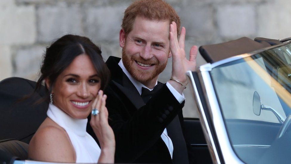Prince Harry and Meghan leave for their reception