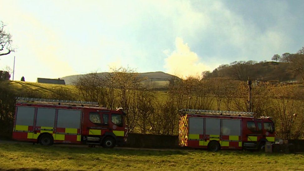 Two fire engines in front of the fire at Glyndyfrdwy