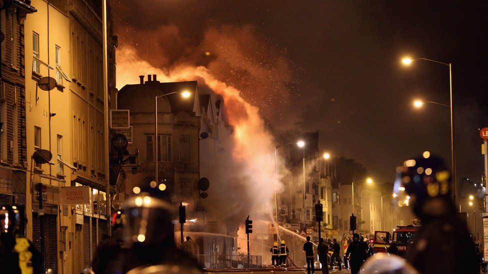 : A large fire breaks out in shops and residential properties in Croydon on August 9, 2011 in London, England.