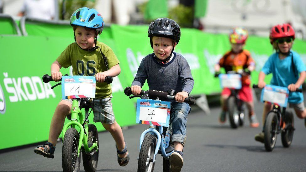 Children cycling in a race