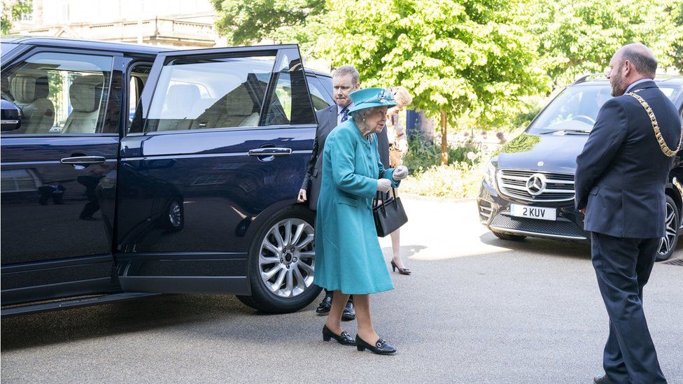 Queen Elizabeth II arrives in a hybrid-electric Land Rover for a visit to the Edinburgh Climate Change Institute, as part of her traditional trip to Scotland for Holyrood Week.
