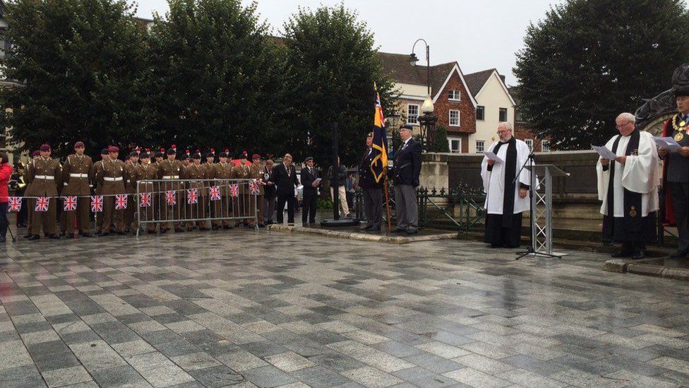 Ceremony at war memorial in Salisbury's Guildhall Square