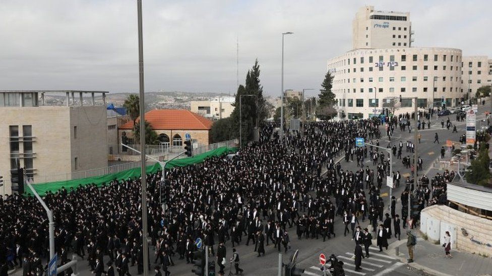 Ultra Orthodox Jews gather around the body of Head of the Brisk Yeshiva, Rabbi Meshulam Dovid Soloveitchik, that passed away
