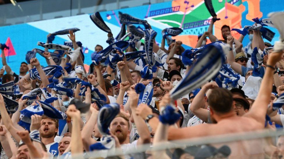 Finland supporters cheer during the UEFA EURO 2020 Group B football match between Finland and Belgium at Saint Petersburg Stadium in Saint Petersburg, Russia, on June 21, 2021